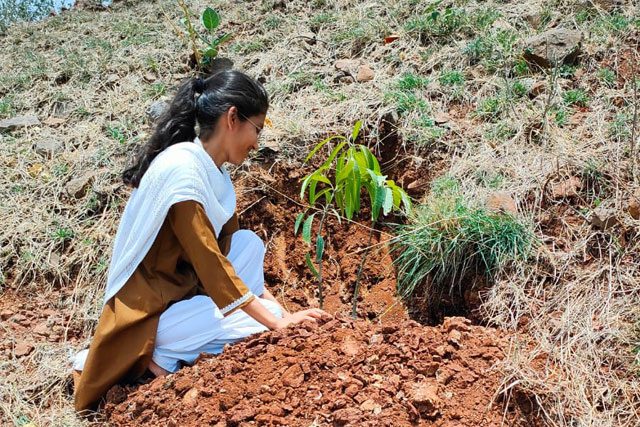 girl-planting-tree